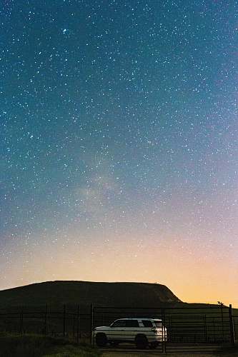 car white SUV under star field lompoc